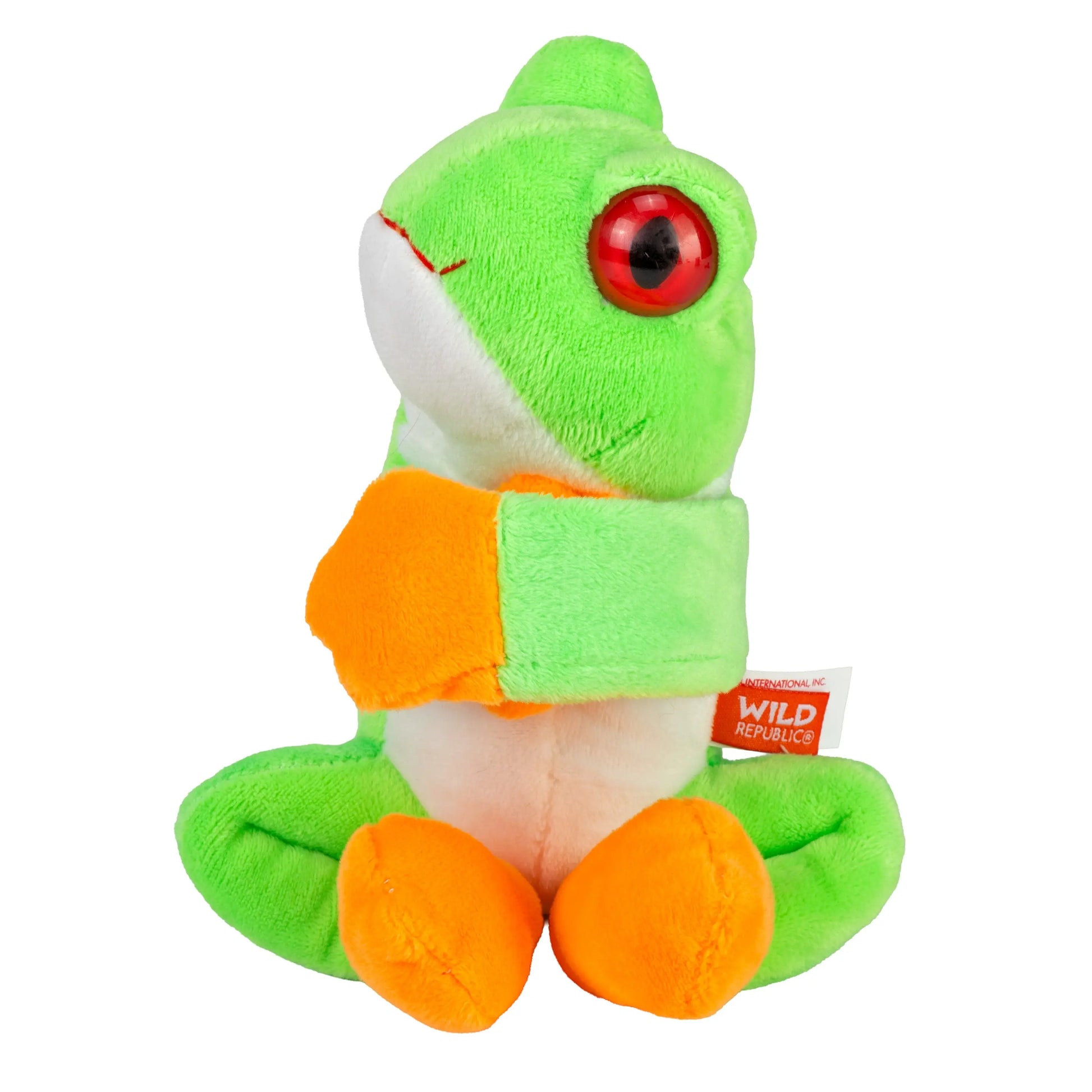 Green and orange plush toy with a red eye on a white background