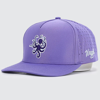 Purple cap with octopus design and 'Waggle' branding on a light gray background