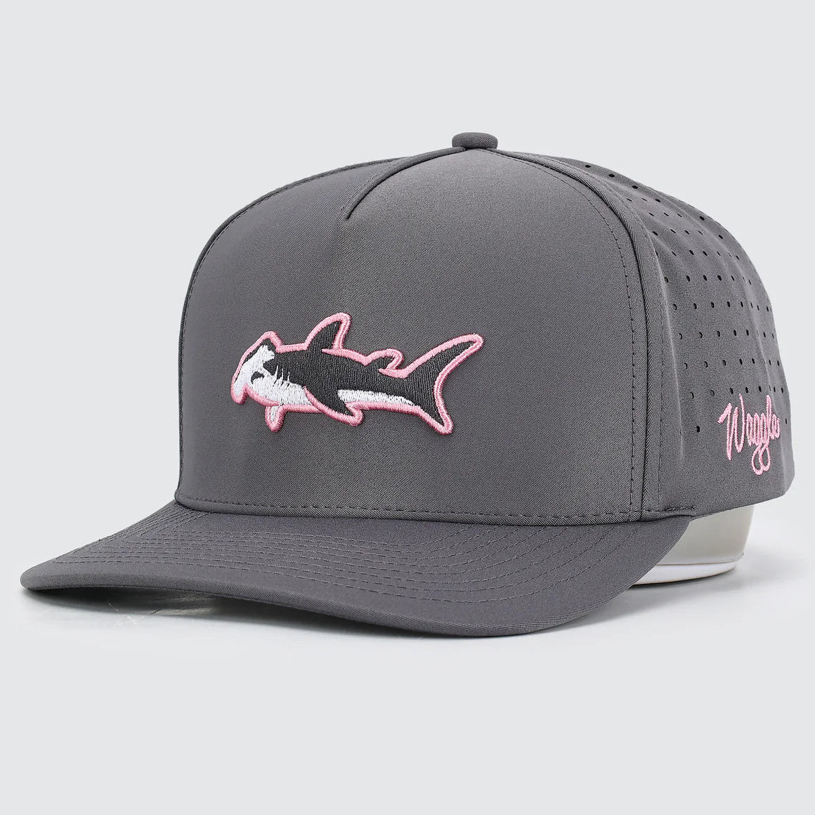 Gray cap with shark embroidery and 'Waggle' branding on a light gray background
