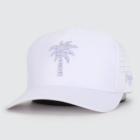 White cap with palm tree design on a light gray background, Waggle brand